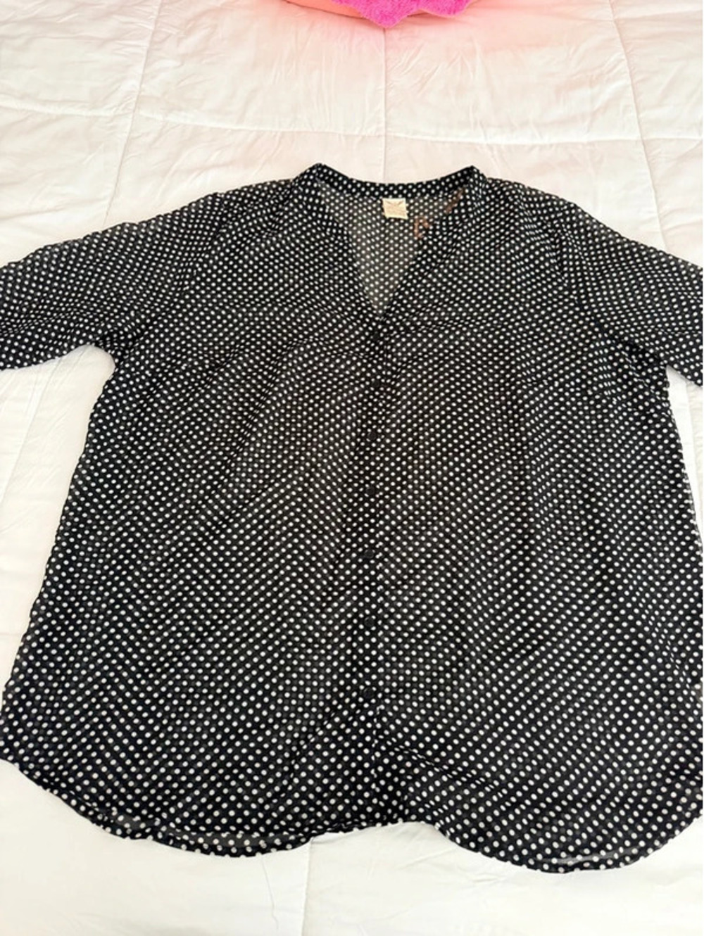 Black & white polka dot polyester blouse with ruffle sleeves